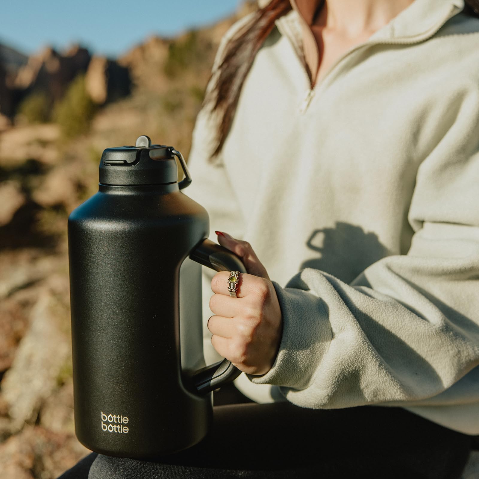 A stock image illustrating 64 oz stainless steel water bottle concepts